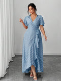 Embrace timeless style with this charming plus-size wrap dress, featuring a classic polka dot pattern that flatters every figure. The adjustable tie waist creates a custom fit while defining your silhouette, while the playful ruffle hem adds movement and dimension. Crafted for comfort and versatility, this dress transitions effortlessly from casual outings to special occasions. Perfect for those who appreciate feminine details without compromising on ease of wear.