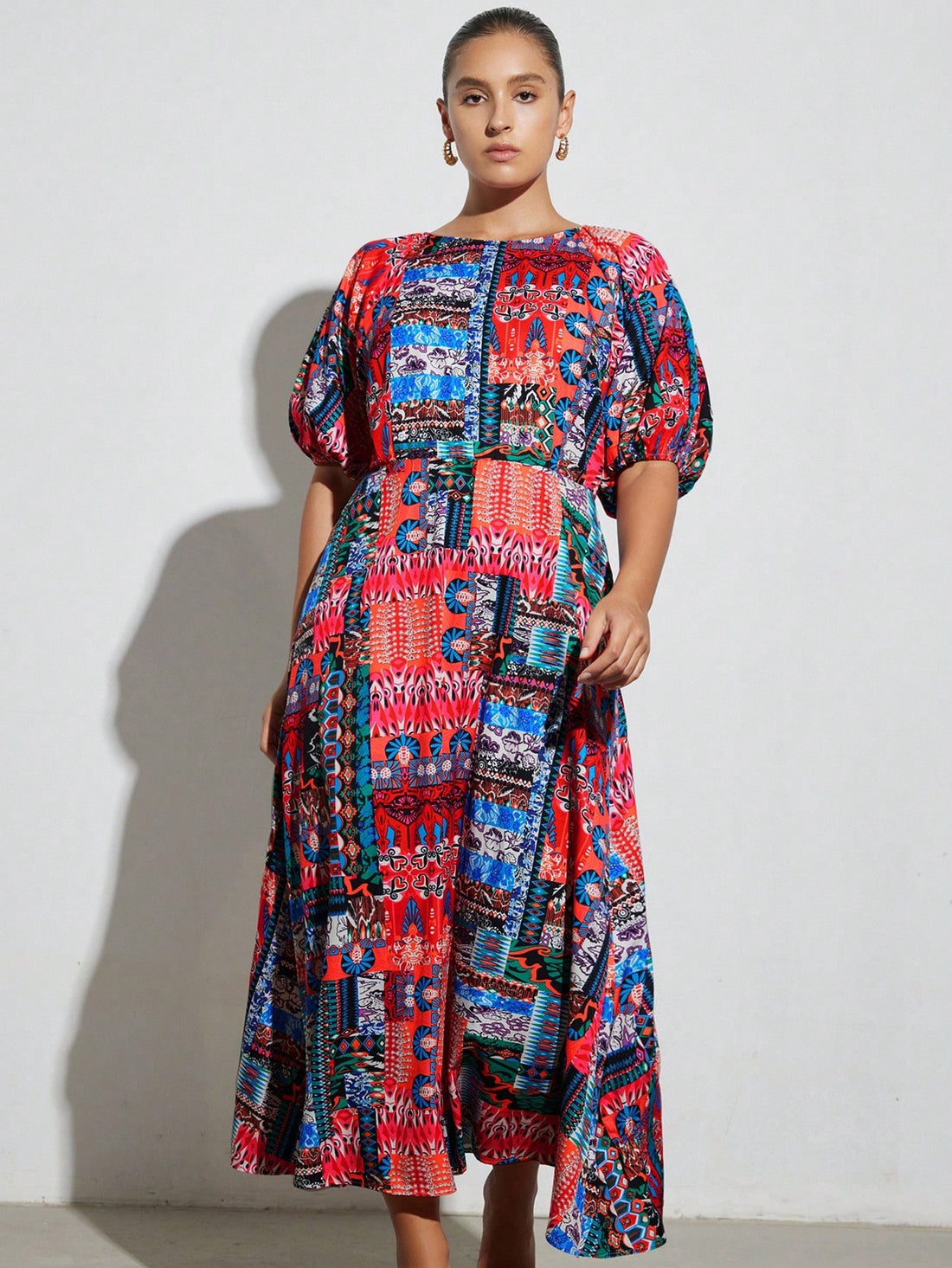 Step into summer with this Stylish Plus Size Retro Printed Puff Sleeve Dress, designed to bring effortless elegance and a playful vintage vibe to your wardrobe. Its charming puff sleeves and eye-catching retro print create a fun, flattering silhouette that celebrates your curves. Perfect for sunny days and warm evenings, this dress combines comfort with timeless style, making every outing feel like a joyful occasion. Embrace your unique flair and turn heads with this delightful summer essential.