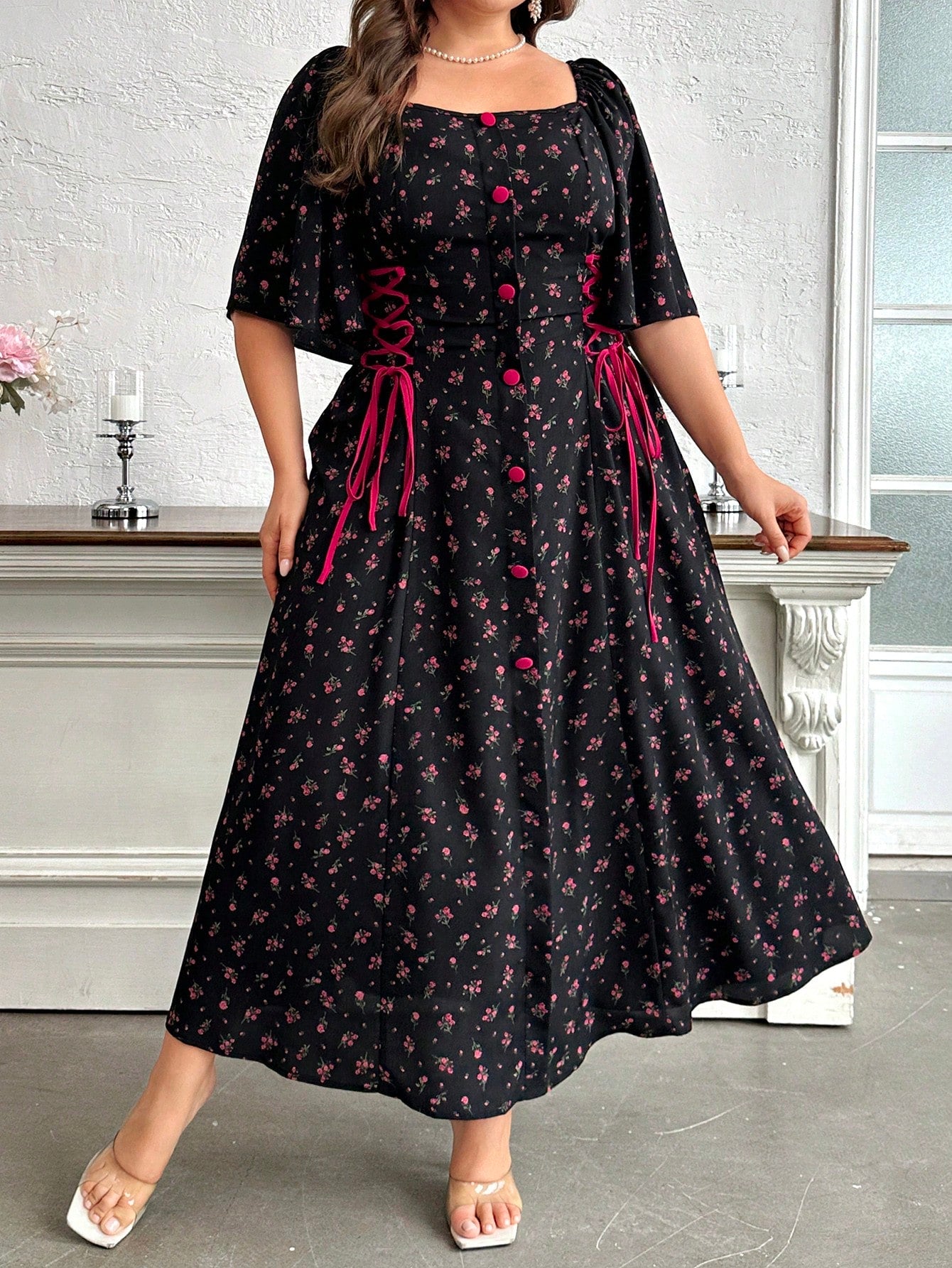 Embrace summer with this flirty plus-size dress that does all the work for you! The playful ruffle sleeves add just the right amount of flounce, while the tie-front detail cinches your silhouette with zero effort. Slip it on for brunches, beach walks, or backyard BBQs – this dress brings the style while you bring the fun! No complicated accessorizing needed – this beauty stands out all on its own.