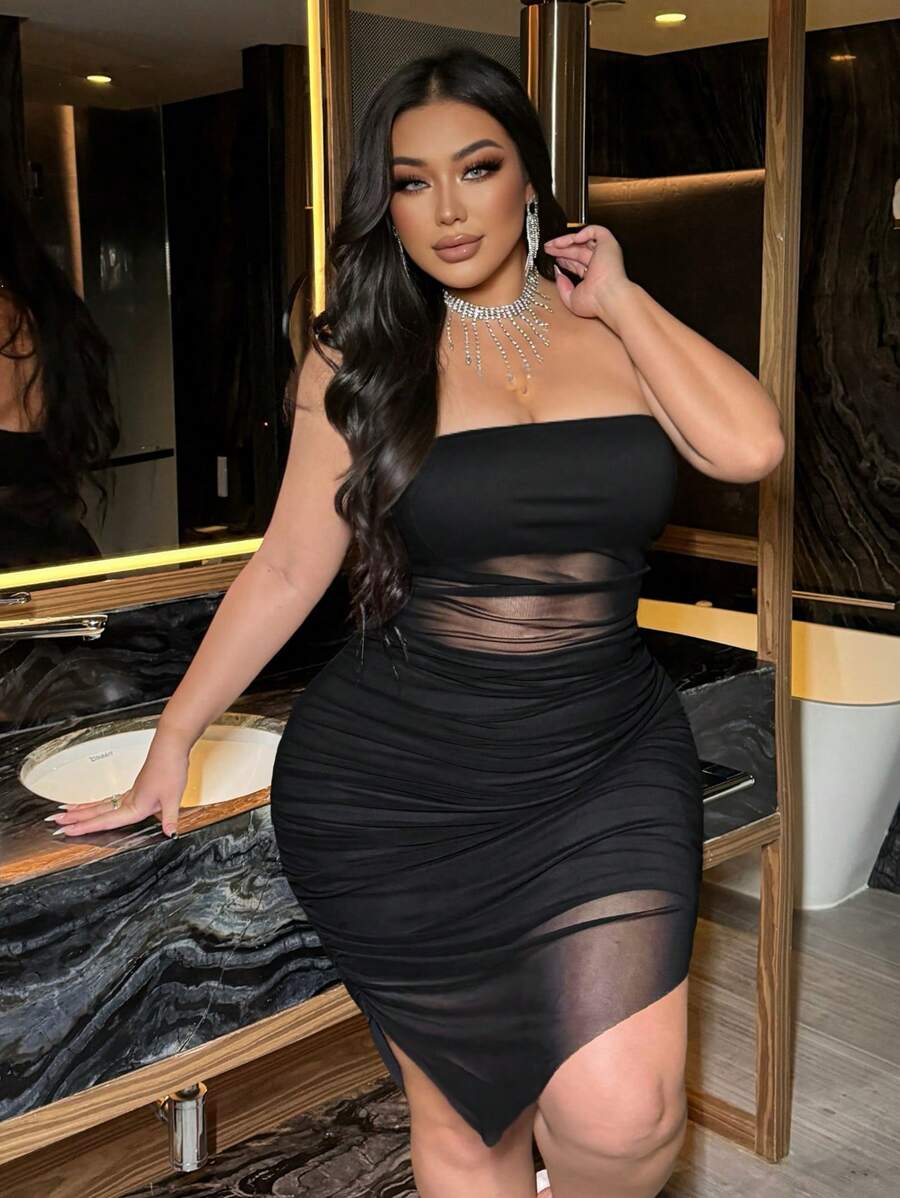 Turn heads with this playful plus size fitted tube dress, crafted with flattering pleats and a sleek solid color. Its snug fit highlights your curves while the pleated detail adds an extra dash of fun flair. Perfect for making a bold statement at any event or night out!