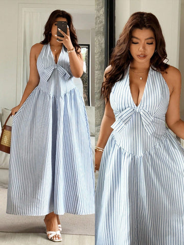 Turn heads effortlessly with this plus size halter neck dress featuring bold stripes and a charming bow decoration. Designed for comfort and style, its flattering fit embraces your curves while the halter neckline highlights your shoulders. Perfect for sunny days or casual outings, this dress brings fun and flair to your wardrobe.