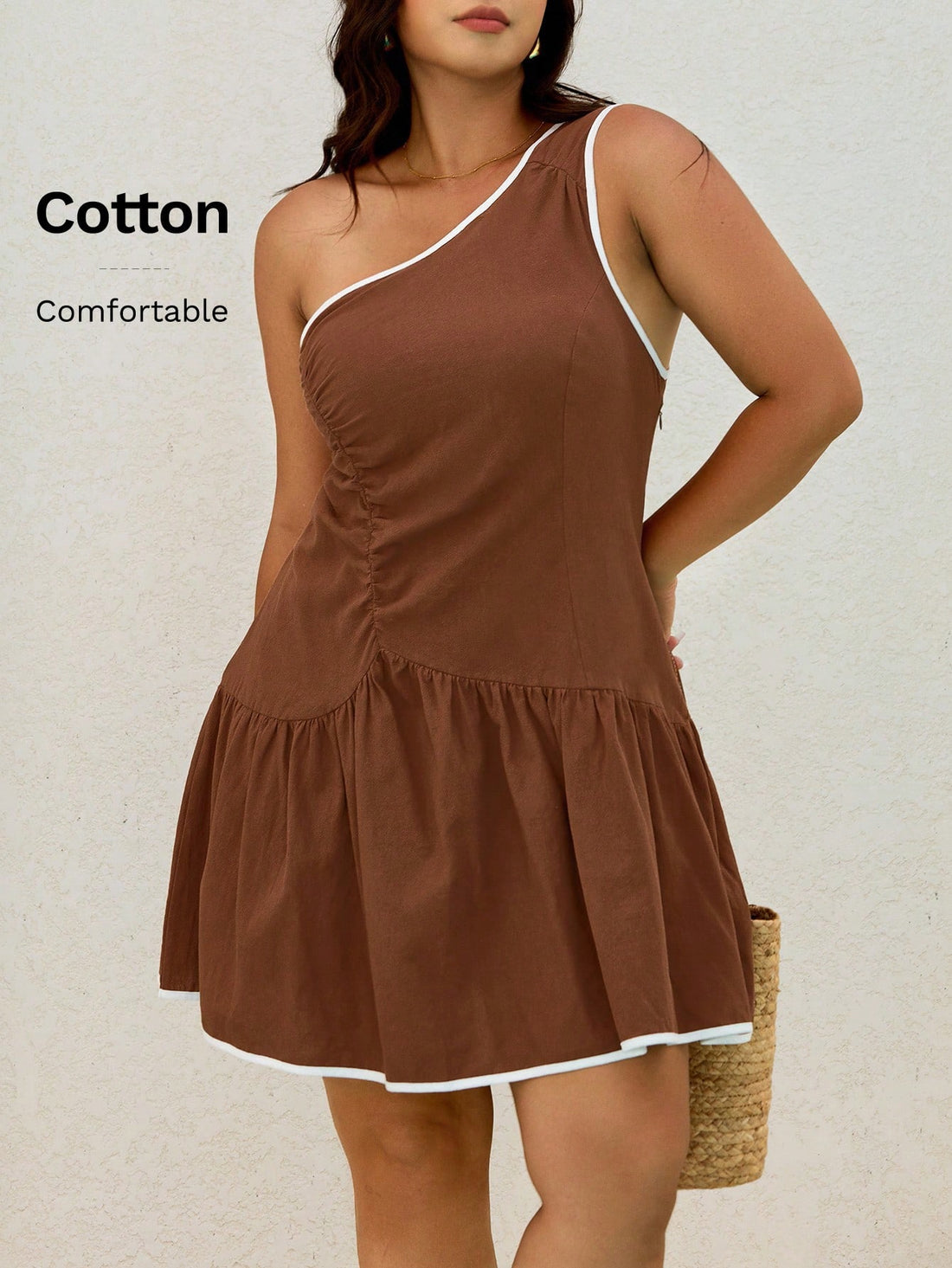 Step into summer with this playful plus size dress, designed to bring effortless elegance to your sunny days. The contrast binding adds a fun pop of detail, while the ruffled hem dances with every step you take. Lightweight and breezy, it’s perfect for everything from beach strolls to casual brunches. Embrace your curves and let this dress become your go-to for stylish, comfortable summer vibes.