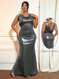 Turn heads effortlessly in this Stylish Plus Size Women's Metallic Dress. Featuring a dazzling metallic sheen, a daring deep V-neck, and a backless asymmetric design, it’s made for those who love to shine at elegant occasions. The flowing long silhouette combines comfort with dramatic flair, making every step a statement. Perfect for nights when you want to feel both glamorous and free-spirited.