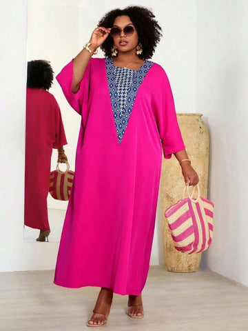 Embrace effortless elegance with this plus-size patchwork geometric print dress, designed for comfort and style. The square neckline and flowing batwing sleeves create a flattering silhouette, while the loose fit and slight stretch chiffon fabric ensure all-day wearability. Contrast sequin details add a touch of sparkle perfect for summer vacations and festive occasions. The modest long length and red violet colorway make it versatile for casual outings, beach getaways, and holiday celebrations. 