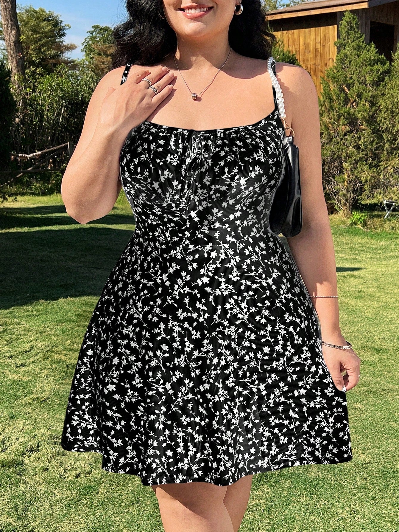 Step into summer with this playful plus size sundress featuring a chic white and black floral print. The lightweight fabric and spaghetti straps keep you cool and comfy, while the boho vibe makes it your go-to for beach days and holiday fun. Effortlessly stylish and perfect for sunny adventures!