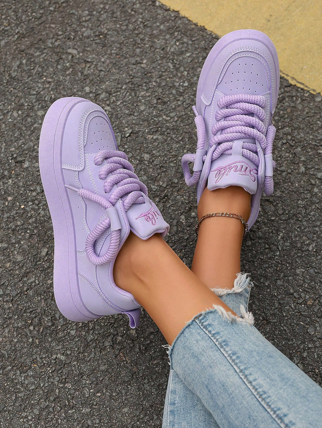 Step into bold style with these eye-catching purple platform sneakers designed for the modern woman on the move. Whether you're crushing it on campus, dancing through your favorite festival, or keeping it casual around town, these kicks deliver serious attitude with every step. The elevated platform sole adds height and confidence while keeping comfort front and center. Perfect for anyone who refuses to blend in and wants their footwear to make a statement as unique as they are.