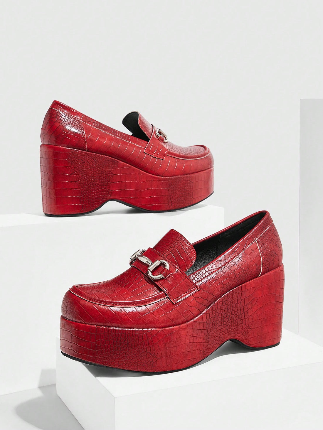 Be the life of the party with these stylish and playful red crocodile pattern platform flats! The unique button detail adds an extra touch of flair, making them perfect for both daily wear and formal events. Comfort and style combined - who says you can't have it all?