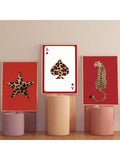 Make a bold statement with this striking red leopard wall art poster. Featuring a contemporary aesthetic animal print design, this piece brings sophisticated style to any space—whether you're decorating a dorm room, bedroom, or living area. The vibrant red tones and detailed leopard pattern create visual interest while maintaining an elegant, modern appeal. Perfect for those seeking to add personality and artistic flair to their walls without overwhelming the space. This versatile poster works seamlessly wi