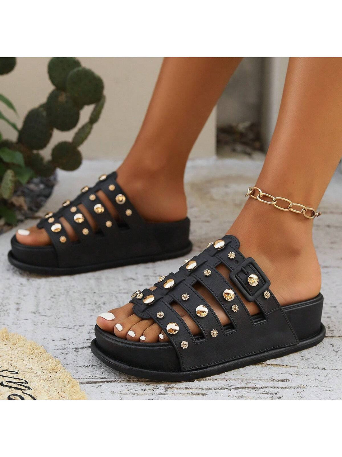 Step into summer with these eye-catching leather sandals! The playful rivet embellishments add a touch of edge to your casual look, while the convenient slip-on design makes them your go-to choice for sunny days. The mid heel offers just the right amount of lift without sacrificing comfort. These versatile slides will jazz up everything from sundresses to your favorite jeans!