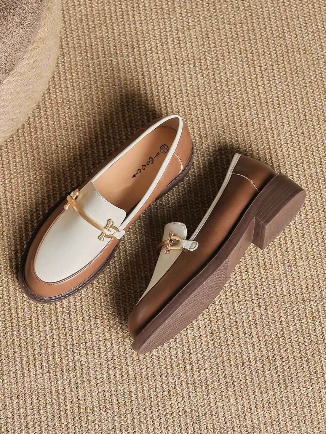 These Stylish Round Toe White and Brown Flat Loafers are the perfect blend of fashion and function, providing a sleek and modern look while also offering excellent comfort and practicality. With their round toe design and classic colors, these loafers are a versatile addition to any wardrobe.