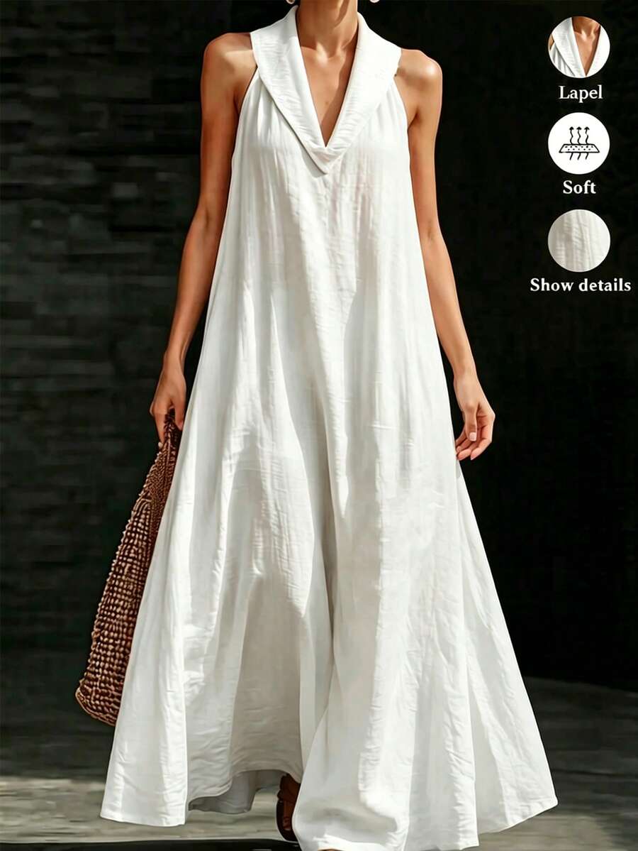 Front view of white sleeveless maxi dress with lapel V neckline and flared hem