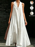 Front view of white sleeveless maxi dress with lapel V neckline and flared hem