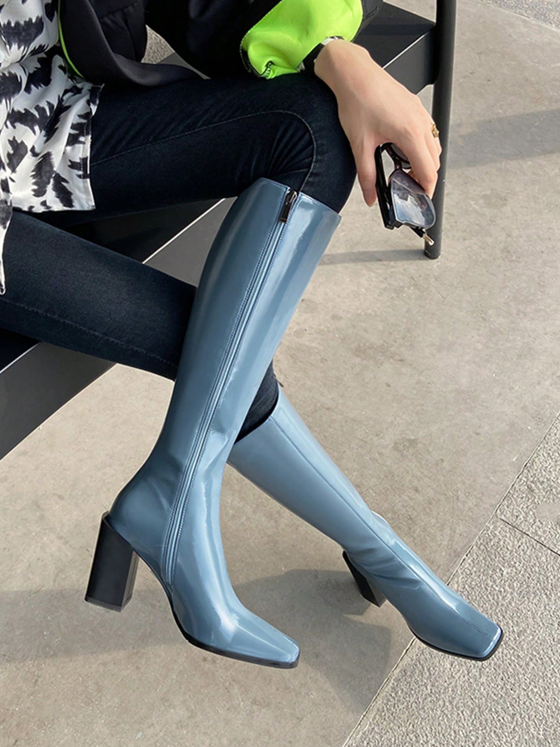 Step into sophistication with these show-stopping knee-high equestrian boots! Crafted from lustrous patent leather, they feature a chic square toe and elevated heel that elongates your silhouette. The sleek over-the-knee design pairs perfectly with dresses, skirts, or tailored pants, making them your go-to choice for autumn galas, winter soirées, and nights out. Whether you're channeling equestrian elegance or modern glamour, these boots deliver serious style credentials. Strut with confidence and turn head