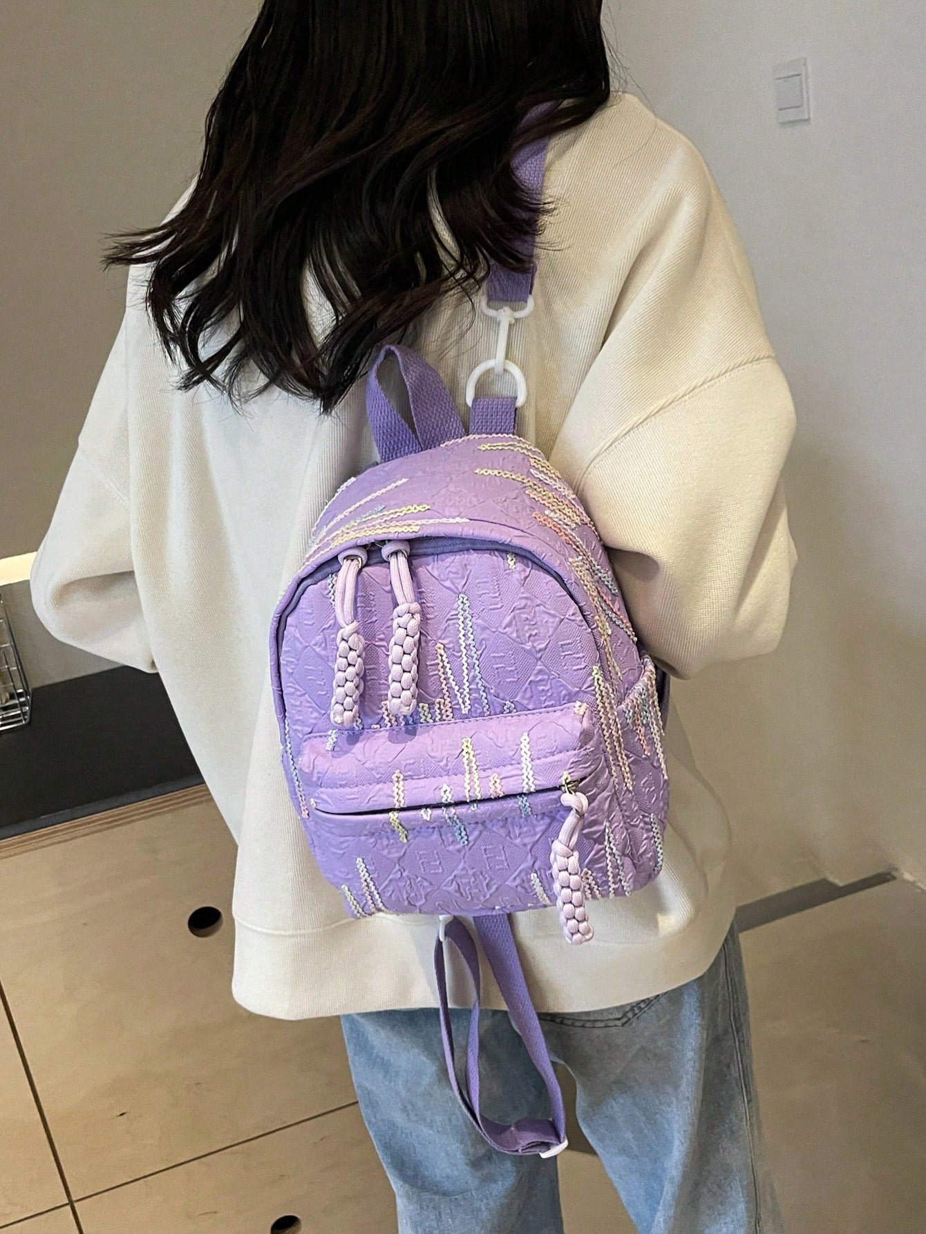 This Stylish Striped Nylon Backpack is the perfect accessory for shopping, travel, and casual outings. It's made from durable nylon and features a trendy striped design, making it both fashionable and functional. Stay organized with its multiple compartments and travel with ease thanks to its lightweight construction.