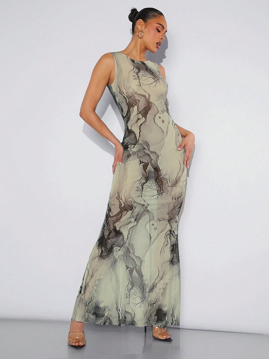 Step into sunshine with this playful summer floral maxi tank dress. Its sleeveless, round neck design keeps you cool while the flowing maxi length adds a breezy, carefree vibe. Perfect for sunny days and warm nights, this dress combines comfort with a splash of floral fun to brighten your wardrobe.