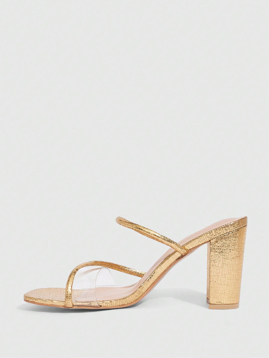Step into sophistication with these show-stopping transparent criss-cross high heels! The bold one-strap design creates an edgy, modern silhouette that commands attention while the see-through upper adds an unexpected twist to your everyday look. Perfect for nights out, special occasions, or whenever you want to make a statement. The sleek heel elongates your legs and pairs effortlessly with dresses, skirts, or even bold pants. Comfort meets style in a shoe that's as daring as you are!