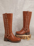 Step out with confidence in these Stylish Two-Lines Studded Tall Boots, designed to turn heads. Featuring bold stud details and a strapped harness, they add an edgy twist to any outfit. Perfect for those who love to make a daring fashion statement while staying comfortable and chic.