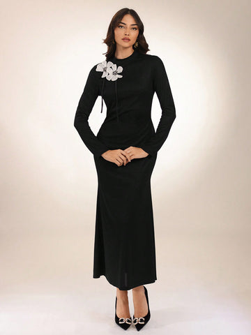 Indulge in stylish urban elegance with this 3D floral black slim fit long dress. Perfect for evening wear, this dress is both chic and comfortable. The slim fit design flatters any body type, while the 3D floral detailing adds a unique touch. Elevate your wardrobe with this must-have dress.