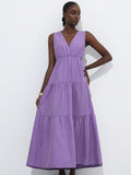Step out in style with this playful V-neck maxi dress, designed for effortless casual elegance. Its solid color and flowing silhouette make it perfect for any occasion, from brunch dates to sunset strolls. Comfortable and chic, this dress lets you embrace relaxed sophistication with a fun twist.