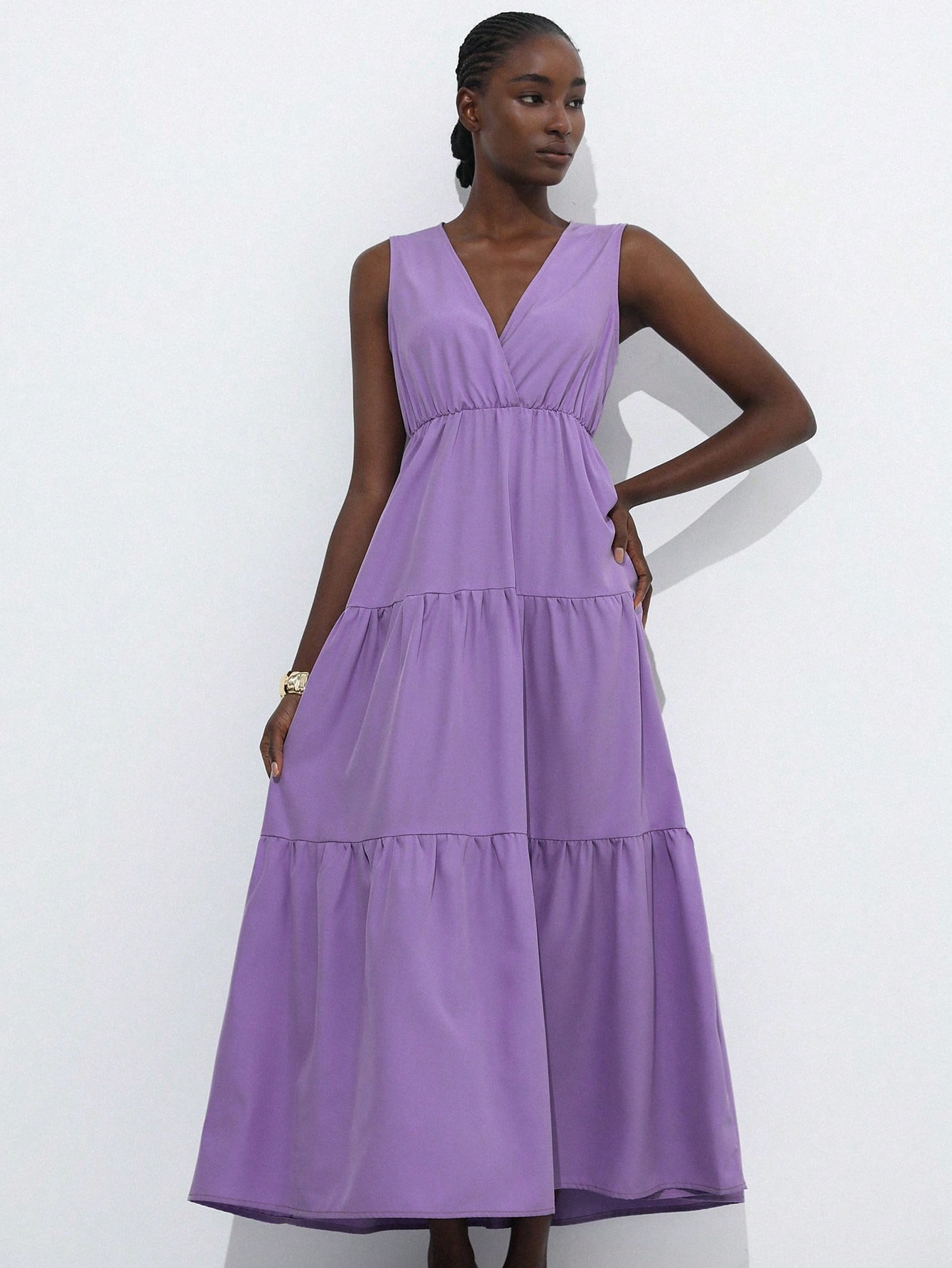 Step out in style with this playful V-neck maxi dress, designed for effortless casual elegance. Its solid color and flowing silhouette make it perfect for any occasion, from brunch dates to sunset strolls. Comfortable and chic, this dress lets you embrace relaxed sophistication with a fun twist.