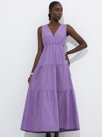 Step out in style with this playful V-neck maxi dress, designed for effortless casual elegance. Its solid color and flowing silhouette make it perfect for any occasion, from brunch dates to sunset strolls. Comfortable and chic, this dress lets you embrace relaxed sophistication with a fun twist.