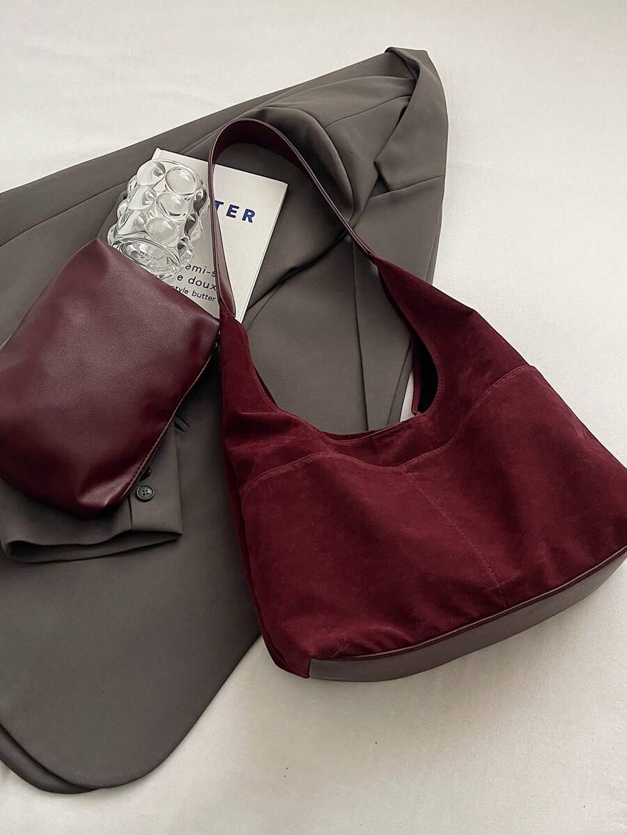 Carry your essentials with a touch of vintage charm! This suede tote combines roomy space and smart pockets, perfect for college days or jet-setting adventures. Soft yet durable, it offers style and function that’s ready to roll wherever you go.