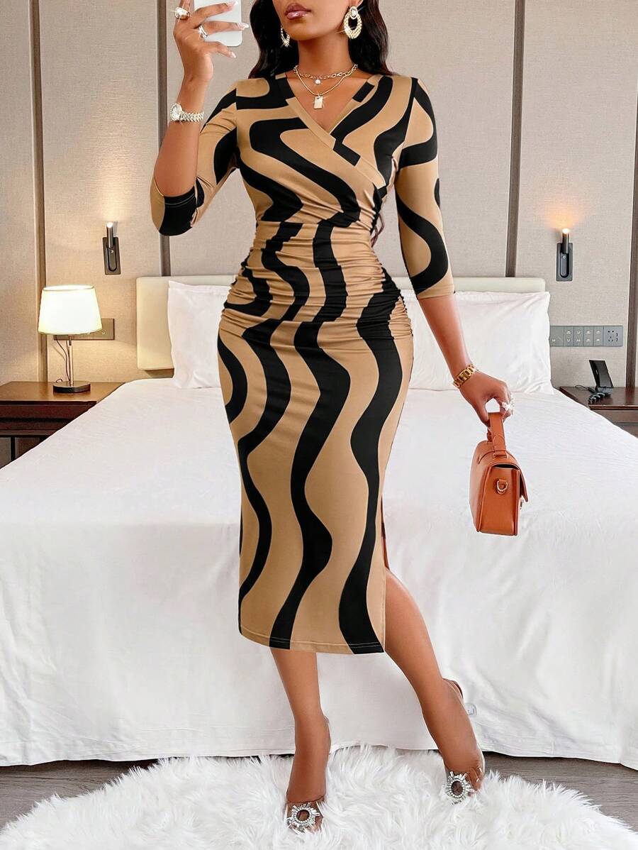 Make waves in this stunning bodycon dress that hugs your curves in all the right ways. The eye-catching wave print adds movement and visual interest, while the flattering V-neck and crisscross detail create a chic focal point. Three-quarter sleeves offer the perfect balance of coverage and style, making it ideal for day-to-night transitions. Whether you're heading to brunch or a night out, this dress delivers effortless sophistication with a fun, flirty edge. Turn heads and feel confident in every step.