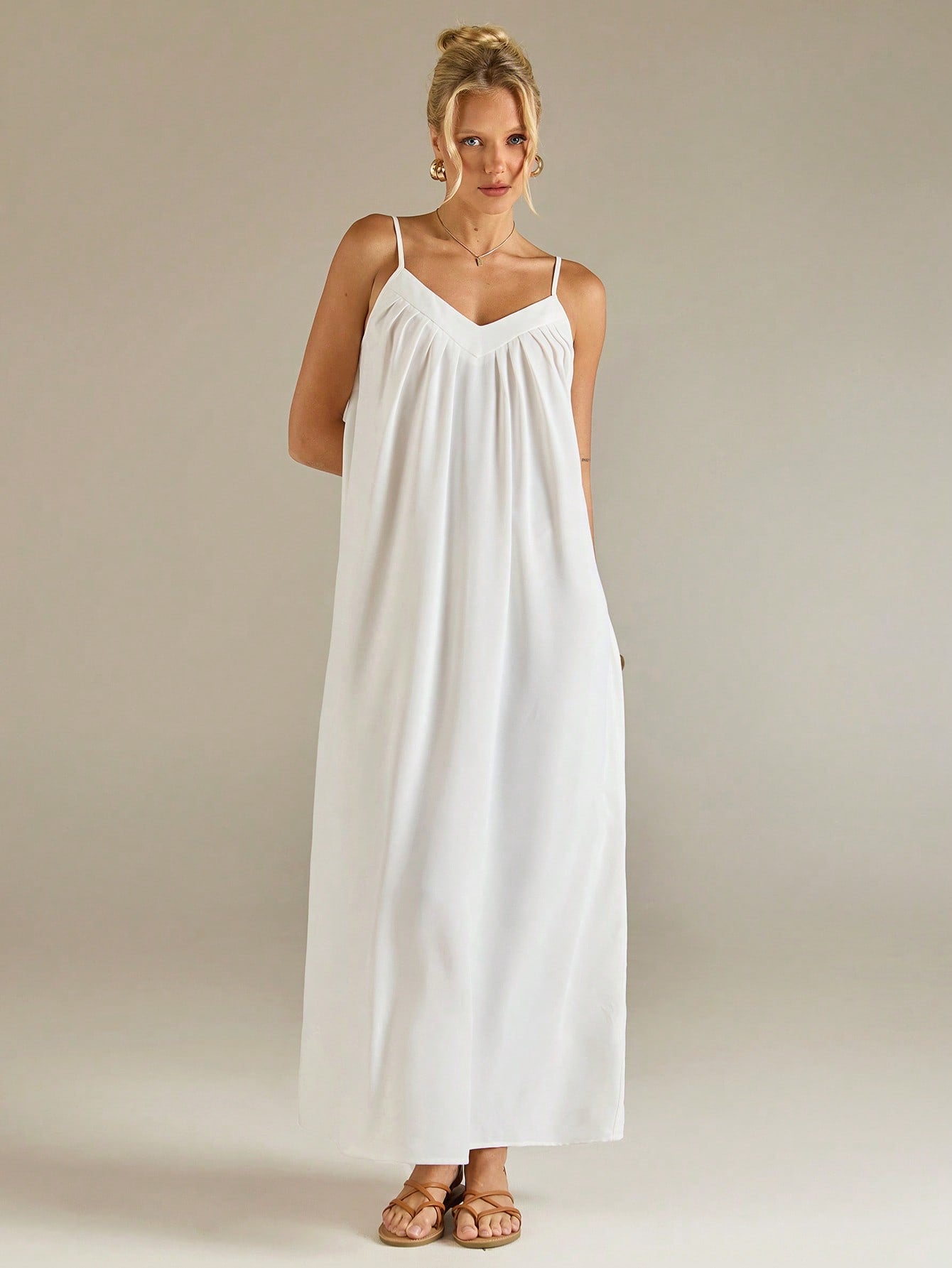 Stylish White Suspender Dress with Pleated Design