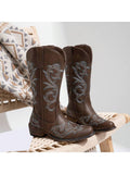 Step into bold style with these white and black square toe cowboy boots designed for women. Featuring intricate embroidery and a convenient inner zipper, they blend classic Western flair with modern ease. Perfect for adding a fun, fashionable twist to any outfit while keeping your feet comfortable and secure all day long.
