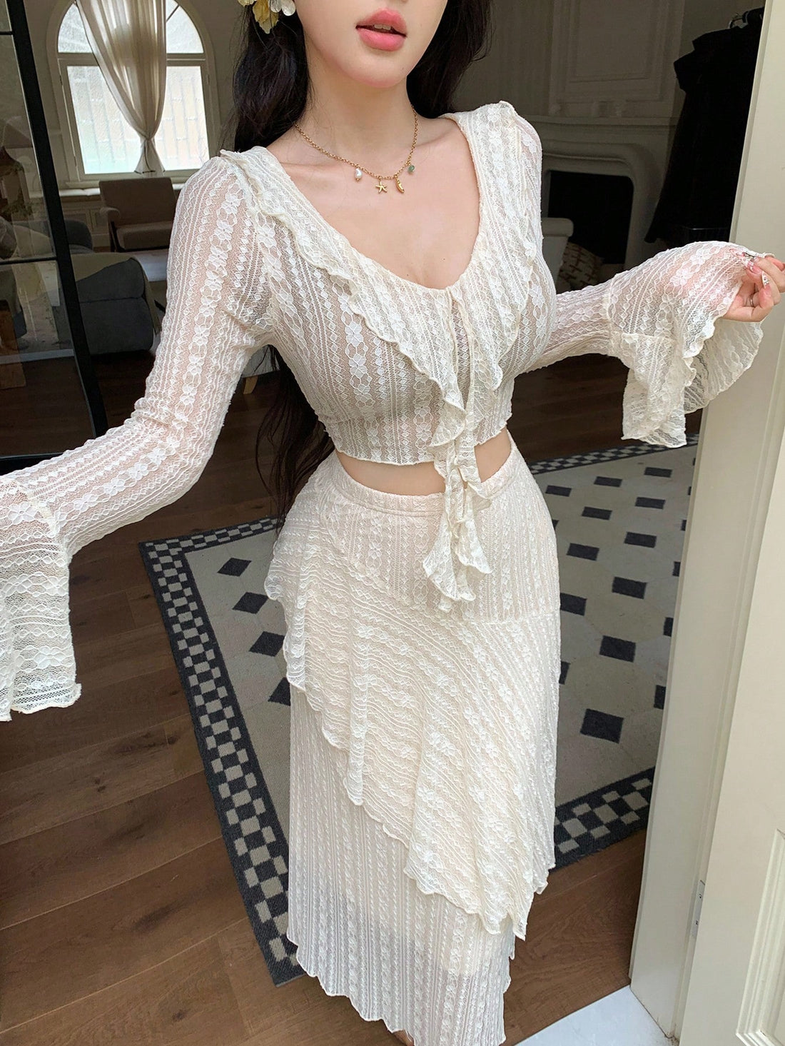 Elevate your everyday style with this charming 2-piece set that's basically a hug for your wardrobe! The long sleeve top features delicate ruffle trim that adds just the right amount of flair, while the coordinating skirt keeps things polished and put-together. Perfect for those days when you want to look effortlessly chic without overthinking it. Mix, match, or wear them together—either way, you're winning the style game. Comfort meets sophistication in this versatile duo that transitions seamlessly from c