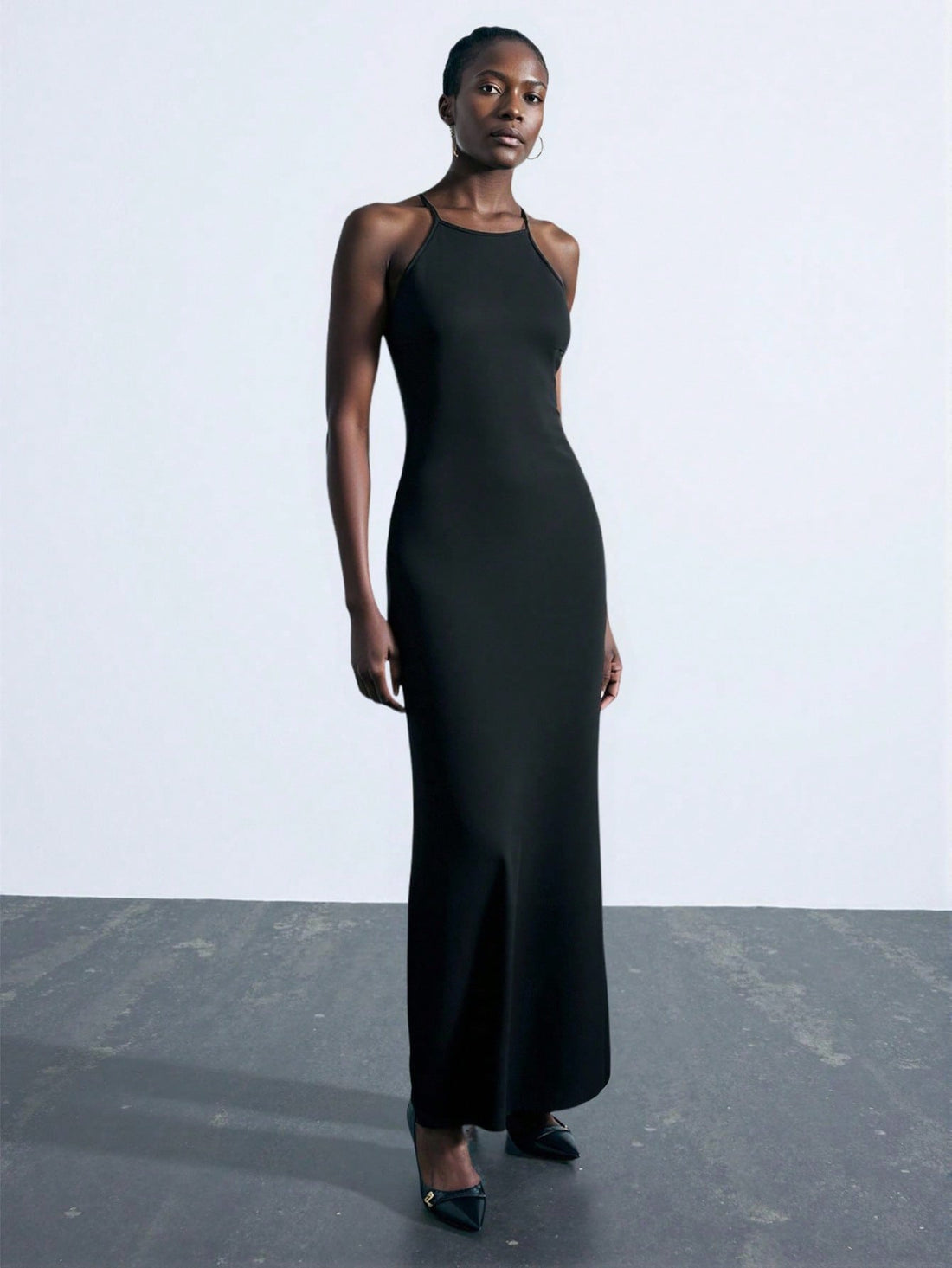 Turn heads wherever you go with this playful yet elegant backless dress. Featuring a criss-cross halter neck design, it blends chic style with a touch of daring flair. Perfect for parties, dinners, or any special event, this dress lets you flaunt your confidence and keep cool while making unforgettable memories.