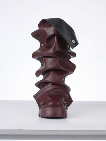 Step out in style with these black mid-calf slouchy boots designed to turn heads at the motorcycle rally or the nightclub. Featuring a comfortable stacked heel, they blend edgy attitude with playful charm, making every step a statement. Perfect for those who love to mix bold fashion with effortless cool.