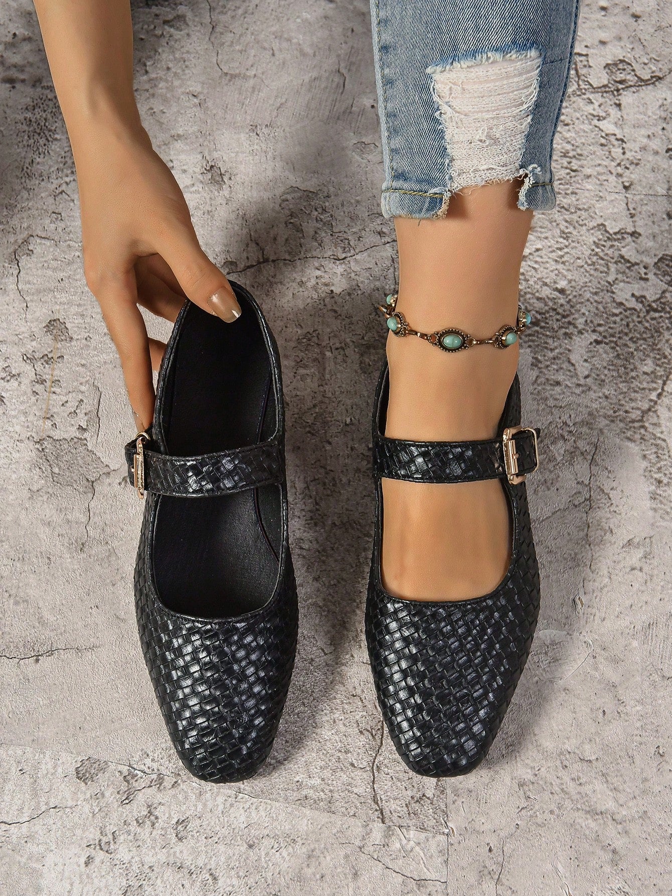 Step into style and comfort with these black woven ballet flats, featuring a chic metallic buckle that adds just the right sparkle. Perfect for everything from casual days out to special occasions, their breathable woven design keeps your feet happy while turning heads wherever you go. Playful yet polished, these flats are your new go-to for effortless flair!