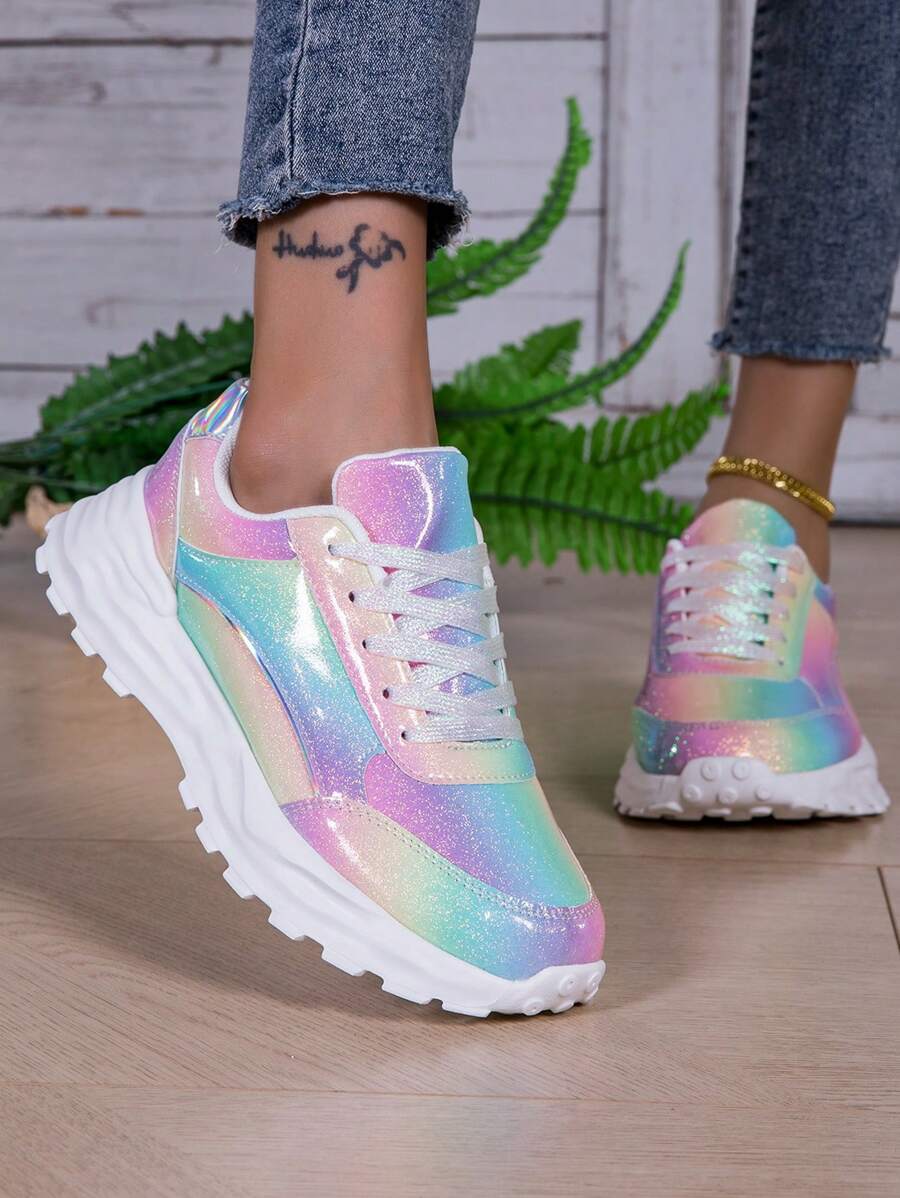 Step into style and comfort with these eye-catching women's sneakers. Featuring breathable mesh construction, they keep your feet cool during workouts, running, or daily wear. The vibrant colorful sequin detailing adds a playful, fashionable touch that stands out from the crowd. Designed for active lifestyles, these sneakers offer reliable support for fitness routines, gym sessions, and back-to-school adventures. 