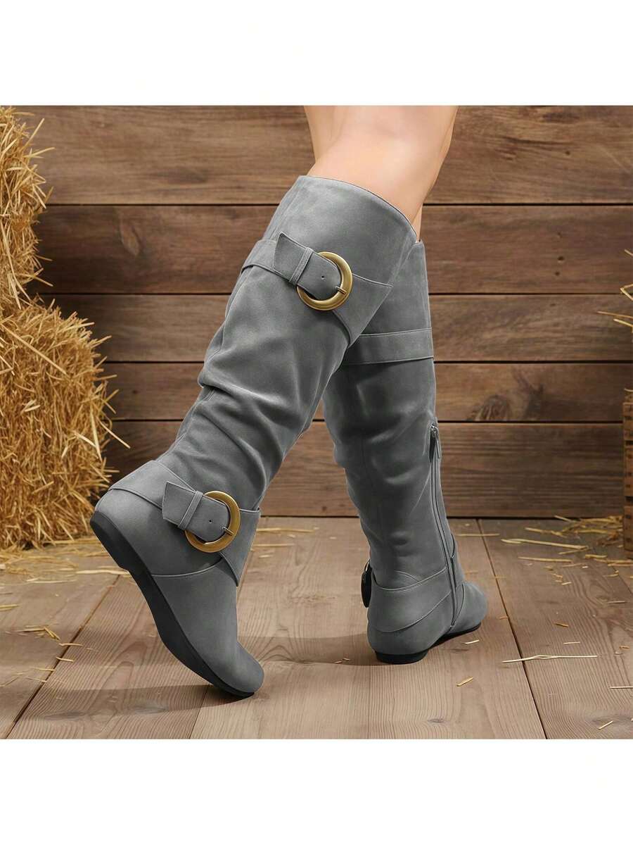 Step into effortless style with these slouchy mid-calf boots that strike the perfect balance between comfort and edge. Featuring a round toe, flat heel, and convenient side zip closure, they're designed for easy on-and-off wear. The decorative buckle detail adds a touch of personality to any outfit, while the relaxed silhouette pairs beautifully with everything from skinny jeans to flowing dresses. Whether you're running errands or heading out for the evening, these versatile boots deliver that coveted laid
