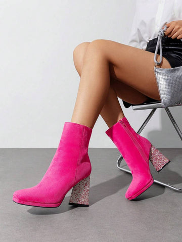 Step into the spotlight with these dazzling chunky heeled ankle boots that turn heads at every celebration. Adorned with eye-catching rhinestones that sparkle under party lights, these boots deliver glamour without sacrificing comfort. The sturdy chunky heel keeps you steady all night long, while the convenient side zipper makes slipping them on and off effortless. Whether you're dancing at a holiday bash or making a grand entrance, these statement boots are your ticket to feeling fabulous and looking absol