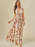 Turn heads with this playful and chic open-back dress featuring bold contrast colors and a sexy printed design. Perfect for making a statement at any event, it combines comfort with eye-catching style to keep you confident and effortless all day or night. Embrace your fun side and stand out with this must-have piece in your wardrobe.