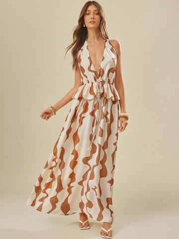 Turn heads with this playful and chic open-back dress featuring bold contrast colors and a sexy printed design. Perfect for making a statement at any event, it combines comfort with eye-catching style to keep you confident and effortless all day or night. Embrace your fun side and stand out with this must-have piece in your wardrobe.