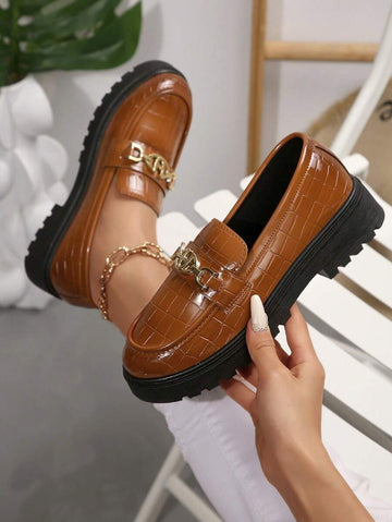 Step into sophistication with these geometric pattern loafers that blend bold style with everyday comfort. Featuring a sleek chain detail and slip-on design, they're perfect for effortless transitions from office to weekend. The oxford flat silhouette offers all-day wearability without sacrificing that polished look. Whether you're dressing up casual outfits or keeping it chic, these loafers are your new go-to pair for making a statement with every step.