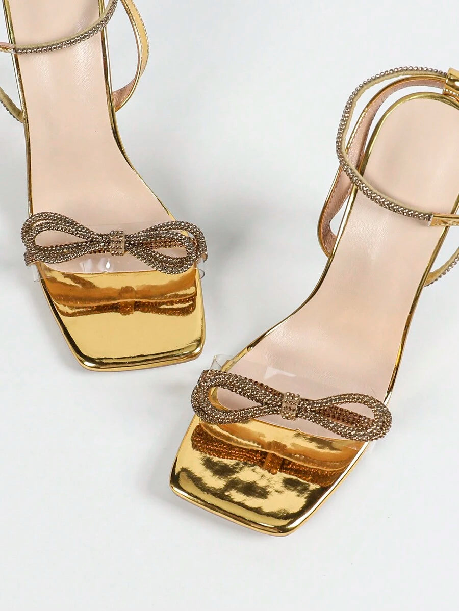 Make a statement this season with these stunning women's high heel rhinestone jelly sandals. Featuring an elegant pointed toe design and shimmering rhinestone embellishments, these strappy sandals deliver glamorous style for any summer occasion. The chunky heel provides comfortable support while the transparent jelly upper creates a modern, eye-catching look. Perfect for parties, date nights, or special events, these versatile sandals pair beautifully with dresses, skirts, or evening wear. Available in a ch