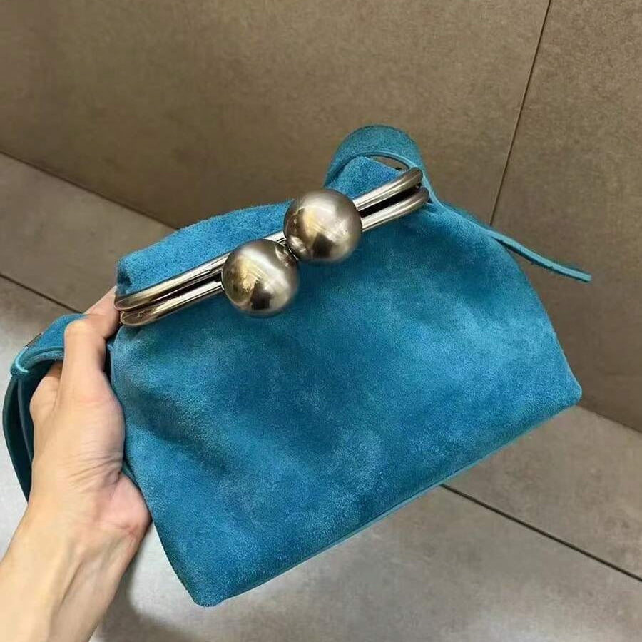 Elevate your everyday carry with this striking women's shoulder bag, featuring a bold hollow-out design paired with personalized rivet detailing. The geometric triangle silhouette combines modern aesthetics with practical functionality, offering ample space for daily essentials. Crafted for the fashion-forward woman who refuses to compromise on style or utility, this tote transitions seamlessly from work to weekend.