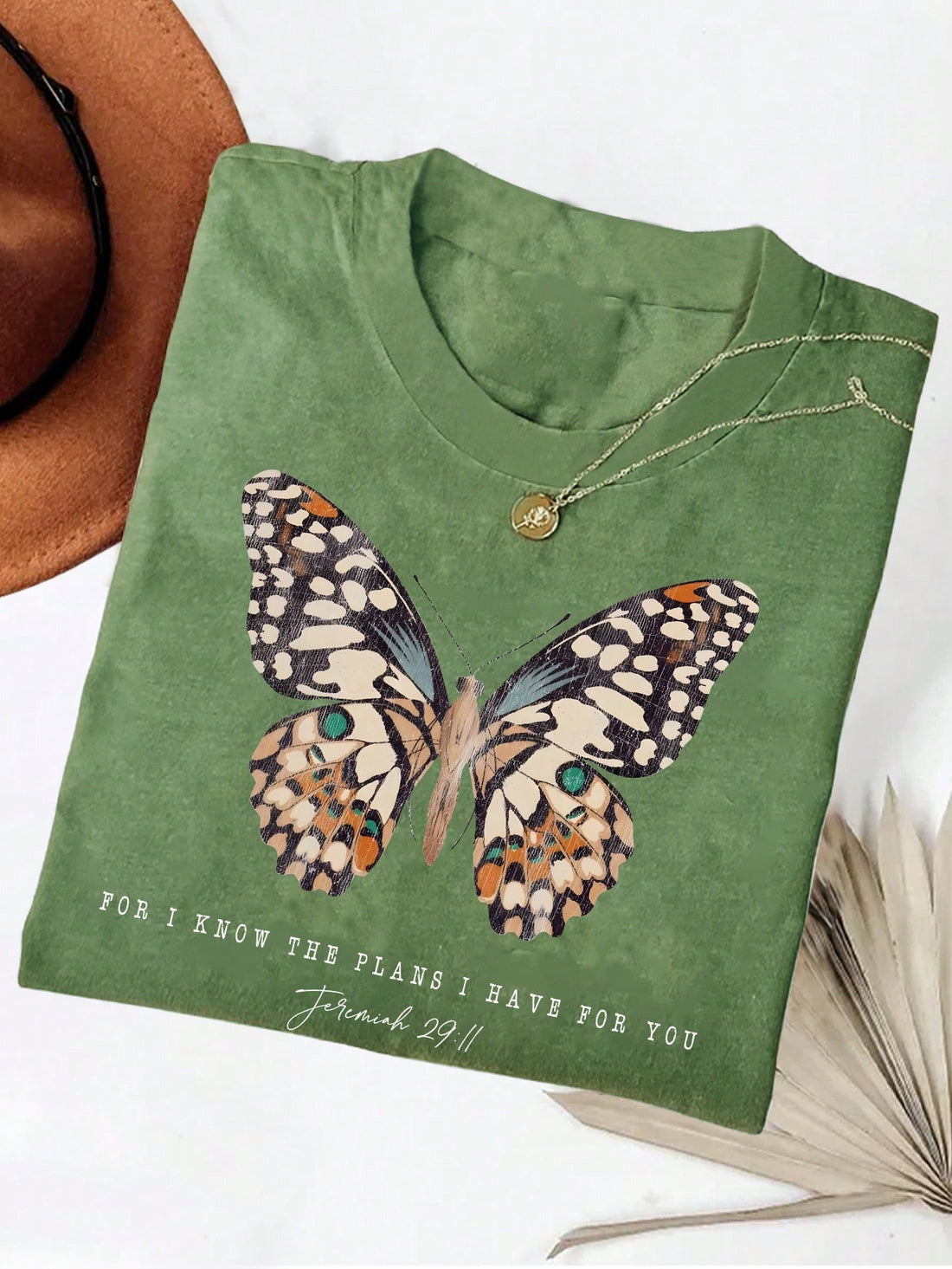 Unleash your quirky faith with our stylish Women's Jesus Graphic Tee! Featuring a bold 'I Know The Plans I Have For You' design, this round neck religious t-shirt is perfect for expressing your faith in a playful and fun way. Show off your unique style and devotion with this must-have tee.