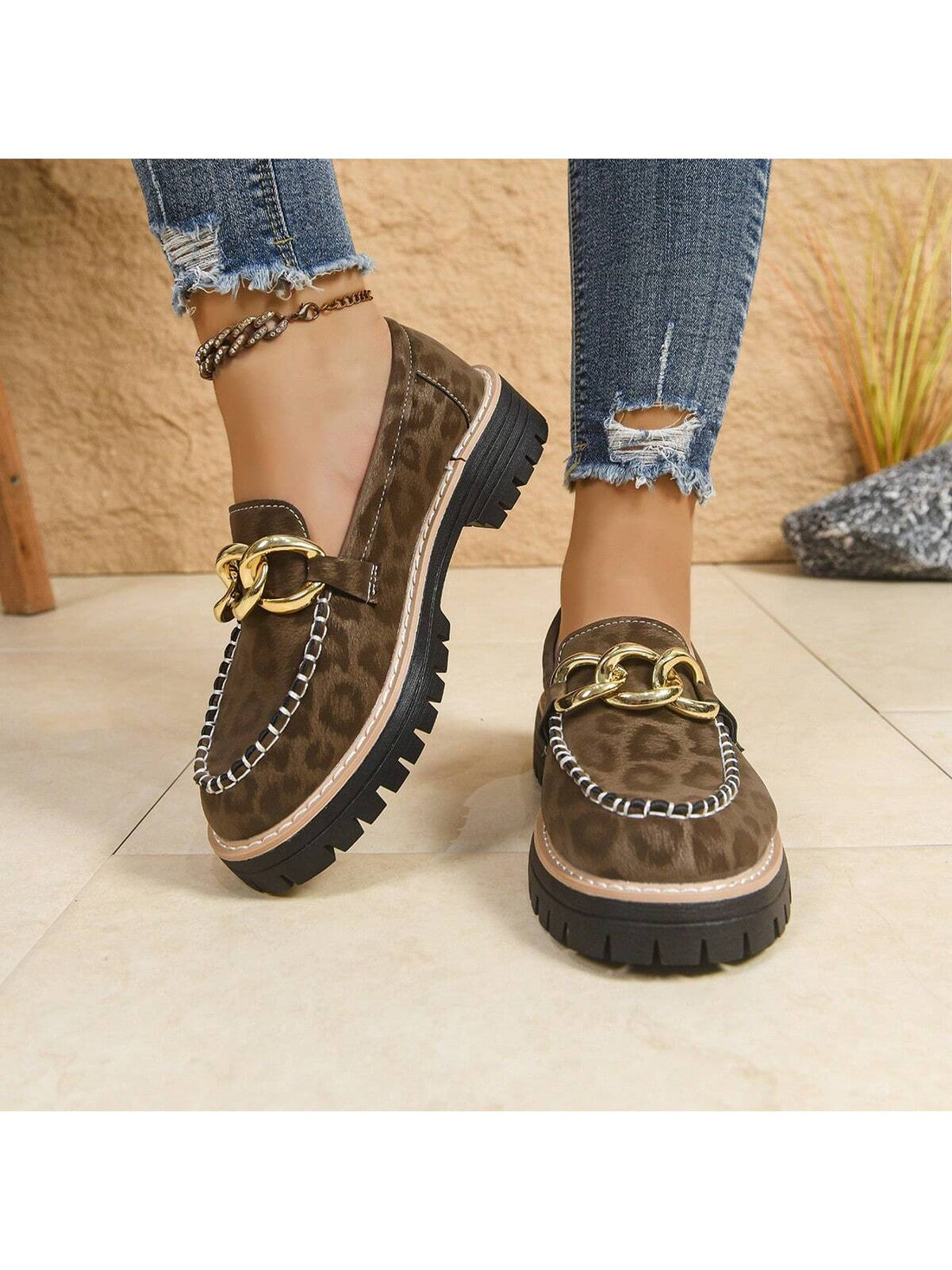 Elevate your casual wardrobe with these stylish women's leopard print platform loafers, designed for both comfort and versatility. Featuring a sleek metal buckle accent, these shoes combine trendy animal print with a modern platform sole to provide added height without sacrificing support. Ideal for everyday wear, they easily transition from day to night, complementing a variety of outfits while ensuring all-day comfort. Perfect for those who value fashion and functionality in one chic package.