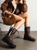 Step out in style and warmth with these playful mid-calf furry snow boots! Featuring an adjustable buckle strap and a convenient side zipper, they’re perfect for keeping cozy while turning heads all winter long. Whether you're braving snowy streets or cozying up by the fire, these boots add a fun, fashionable touch to your cold-weather wardrobe.