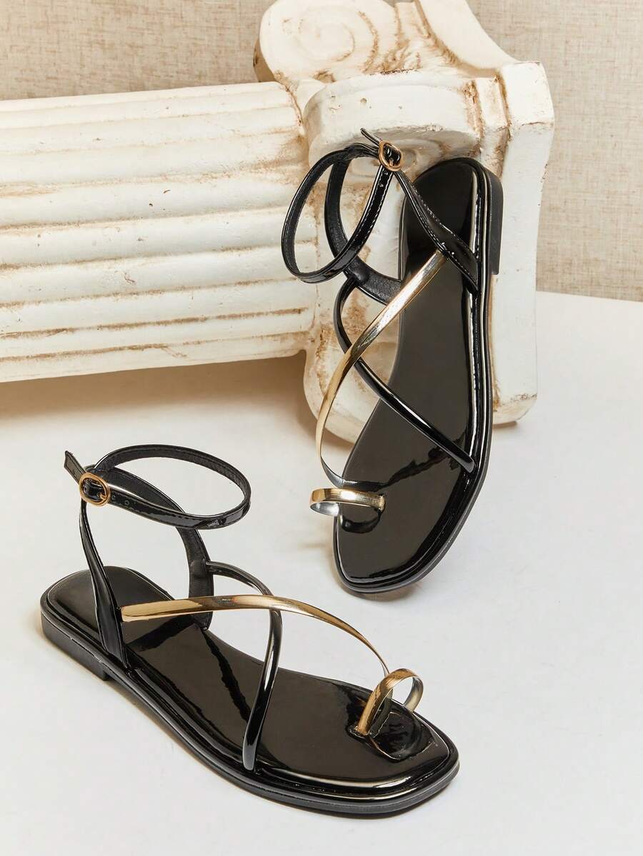 Effortless elegance meets everyday comfort with these minimalist flat sandals. The crisscross ankle strap design provides secure support while maintaining a sleek, modern silhouette. Perfect for casual outings, beach days, or relaxed weekends, these sandals blend style with practicality. The flat sole ensures all-day wearability without sacrificing sophistication. A versatile essential that pairs seamlessly with any warm-weather wardrobe.