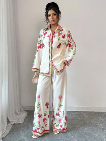 Elevate your fall wardrobe with this vibrant two-piece set that's equal parts fun and fabulous. The long sleeve shirt features eye-catching digital prints in a gorgeous multi-color palette that instantly lifts any outfit, while the coordinating pants offer a comfortable, flattering fit. Perfect for layering on cooler days or standing out at casual gatherings, this set brings effortless style to your everyday rotation. Mix, match, or wear together—either way, you're guaranteed to turn heads this season.