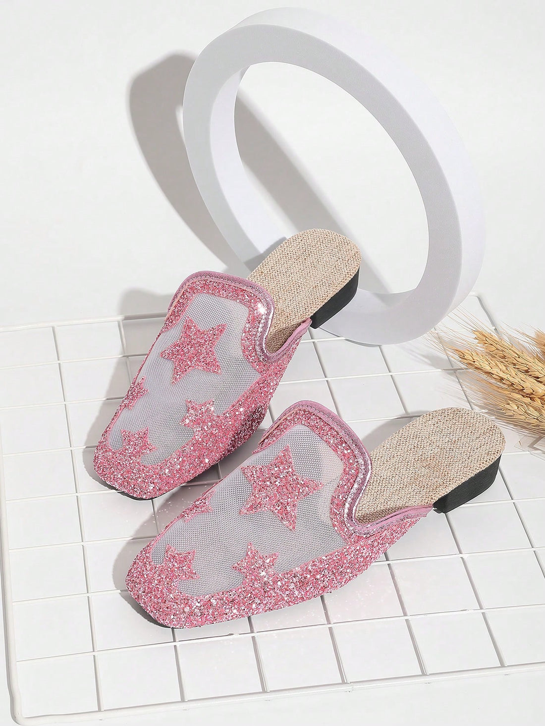 Add some sparkle to your summer wardrobe with our Stylish Slip-On Flat Sandals! Featuring star sequins and a lace design, these sandals provide both elegance and comfort for any occasion. Step out in style this season!