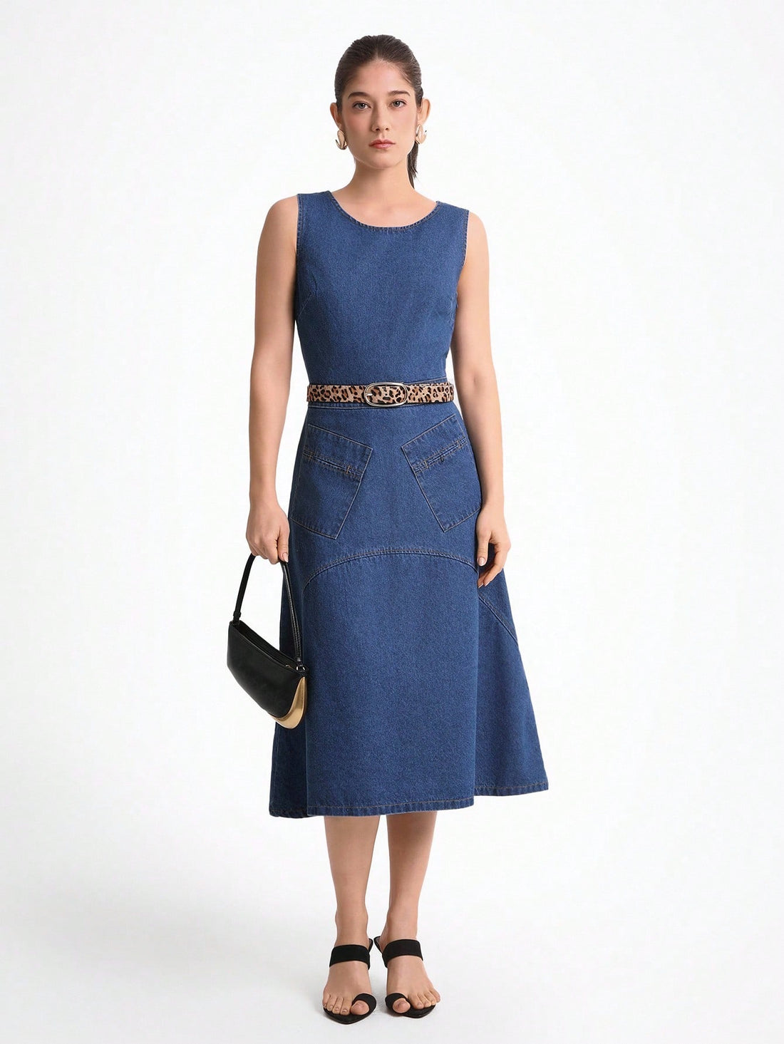 Step out in style with this playful sleeveless denim dress featuring a chic asymmetric hem. Its solid color design keeps it effortlessly cool and versatile, perfect for casual outings or spontaneous adventures. Lightweight and comfy, it’s your new go-to for easy, laid-back fashion with a fun twist.