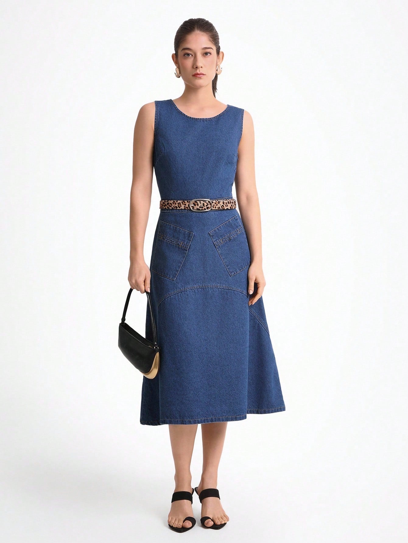 Step out in style with this playful sleeveless denim dress featuring a chic asymmetric hem. Its solid color design keeps it effortlessly cool and versatile, perfect for casual outings or spontaneous adventures. Lightweight and comfy, it’s your new go-to for easy, laid-back fashion with a fun twist.