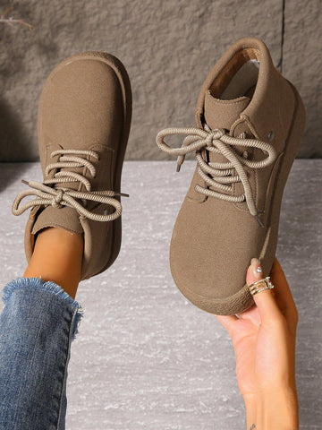 Step into fall flair with these playful women's short boots! Featuring a chic solid color and trendy lace-up design, their thick sole adds comfort and confidence with every step. The fold-over collar brings a fun, flirty vibe perfect for crisp autumn days and stylish adventures. Whether paired with jeans or dresses, these boots elevate your look while keeping your feet cozy and cool.